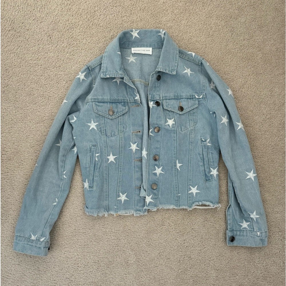 Light wash denim jacket with embroidered stars